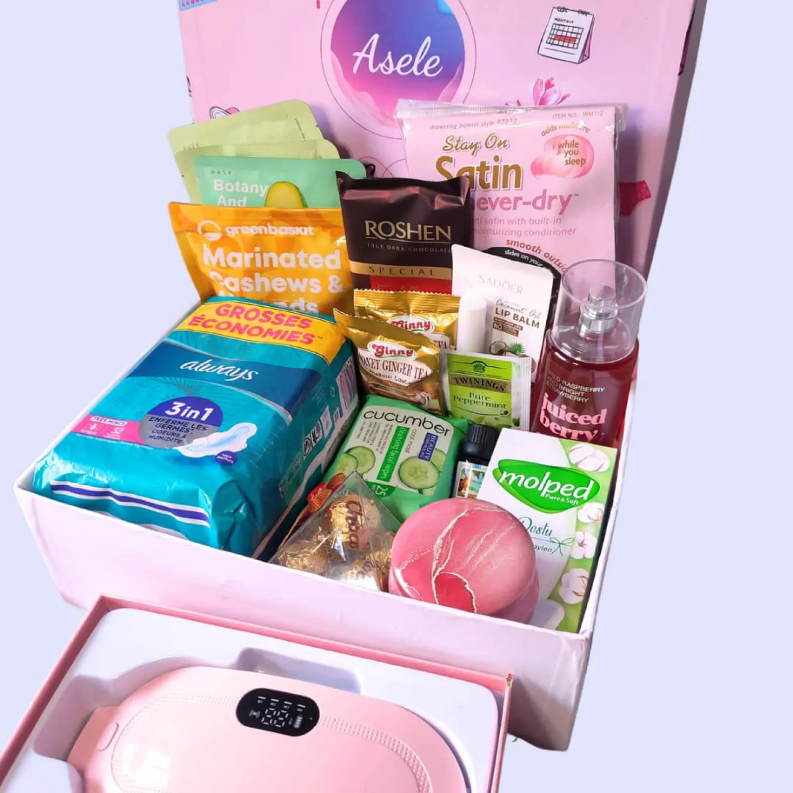 Asele period care package filled with pads, tea, chocolate, and self-care items